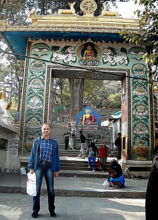 The author poses at a temple grounds entrance